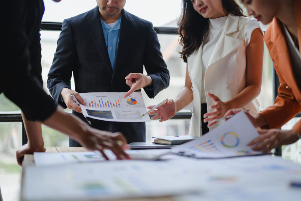 business team analyzing financial charts and graph 2025 08 27 10 01 54 utc scaled.jpg